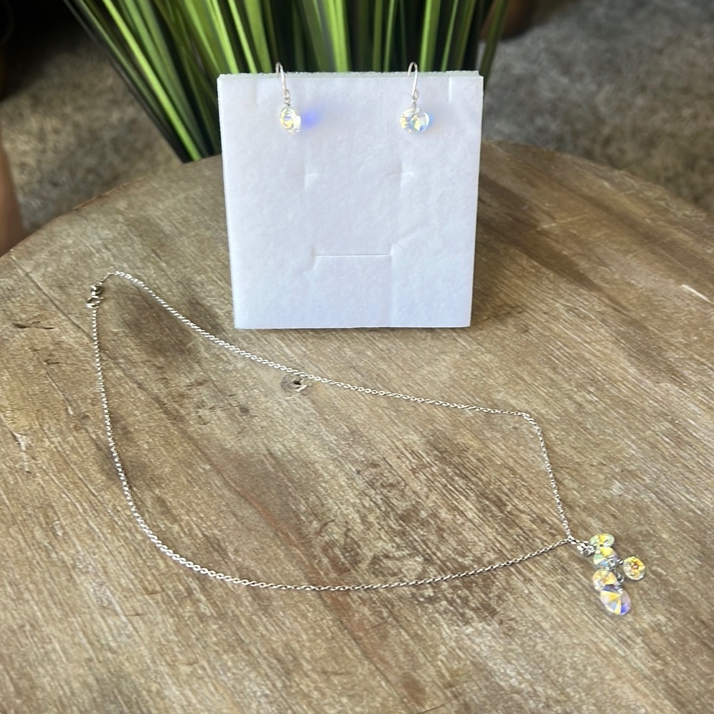 Delicate iridescent necklace and earrings. Super lightweight. Never worn.